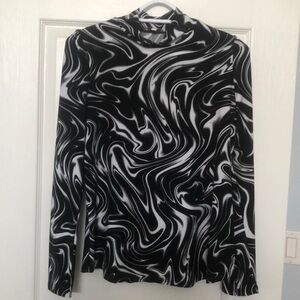 2/$25. - Laura long sleeved top, Size Large with black and white swirl pattern.